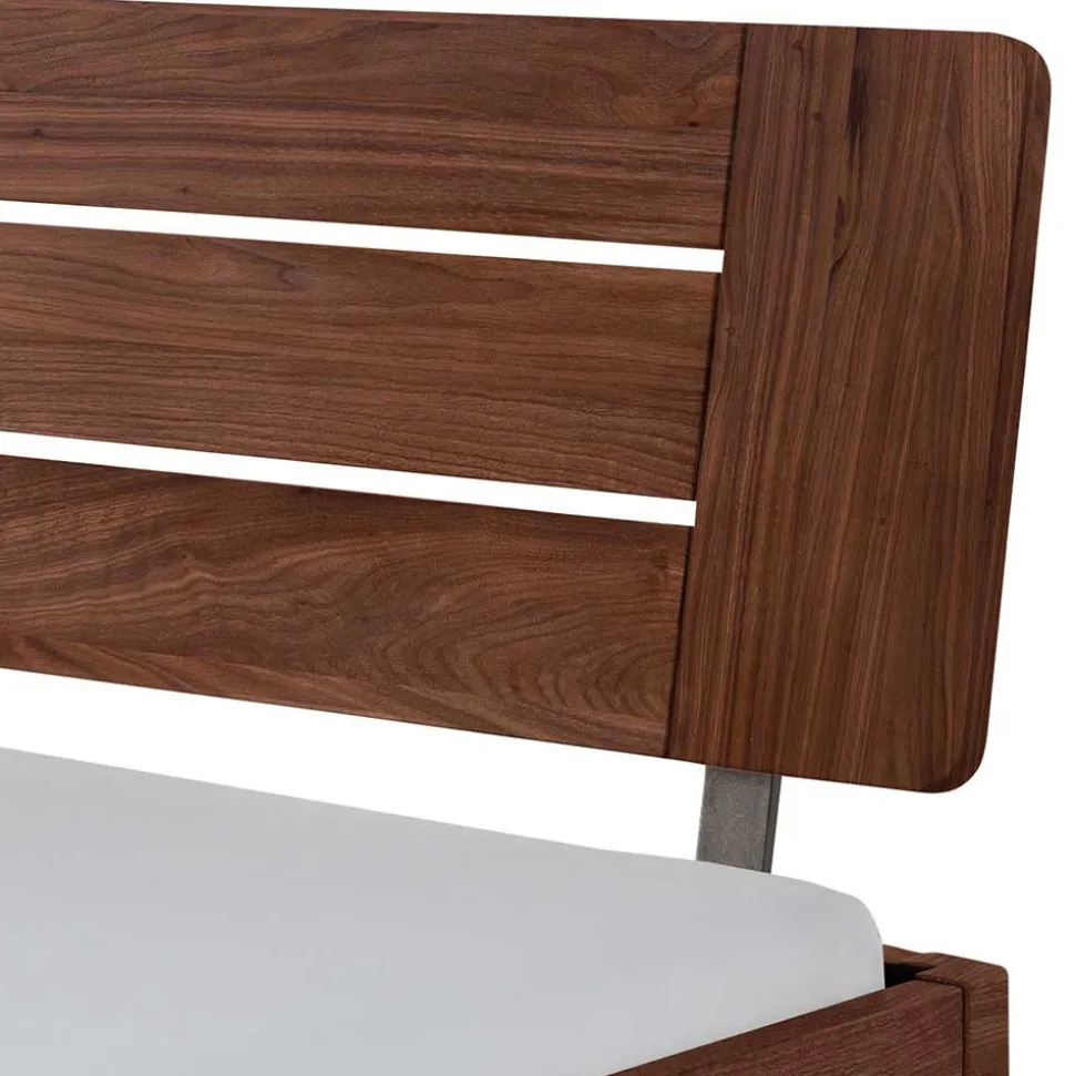 Dunkelbraunes Massivholzbett aus Nussbaum - Elivazon