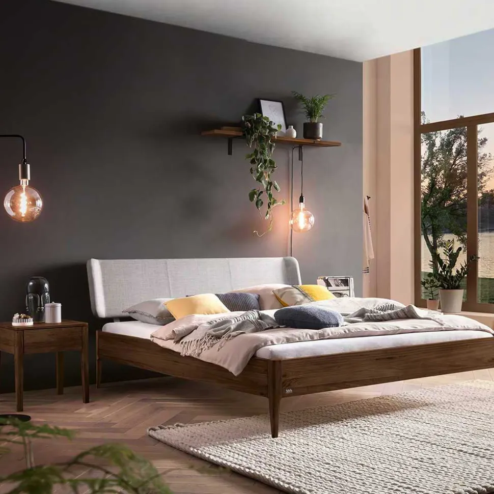 Nussbaum Bett mit extravagantem Kopfteil - Astosa