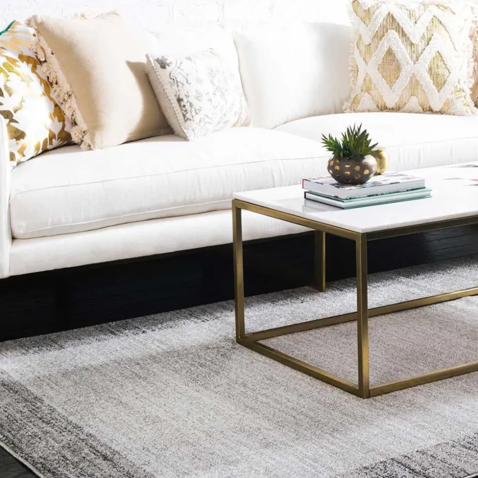 Teppich in Hellgrau mit dunkelgrauem Rand - Armina