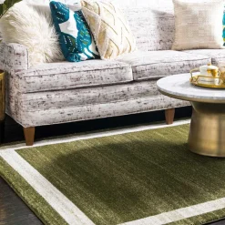 Teppich in Oliv Grün mit Rahmen in Creme - Loritana