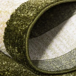 Teppich in Oliv Grün mit Rahmen in Creme - Loritana